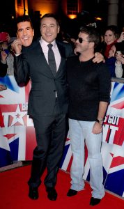 David Walliams holds a Simon Cowell Mask as they arrive at the Birmingham audtions for Britain's Got Talent