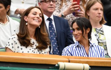 Meghan, Duchess of Sussex and Catherine, Duchess of Cambridge attend day twelve of the Wimbledon Lawn Tennis Championships at All England Lawn Tennis and Croquet Club on July 14, 2018 in London, England. (Photo by Clive Mason/Getty Images)