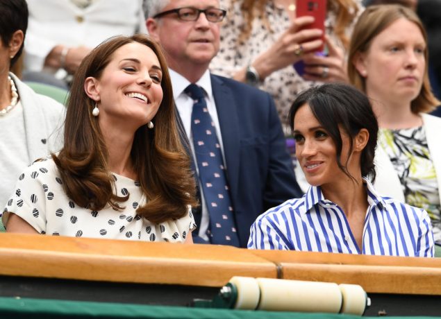 Meghan, Duchess of Sussex and Catherine, Duchess of Cambridge attend day twelve of the Wimbledon Lawn Tennis Championships at All England Lawn Tennis and Croquet Club on July 14, 2018 in London, England. (Photo by Clive Mason/Getty Images)