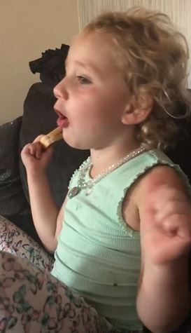 Kieran Hayler watches England's World Cup semi final with children Bunny and Jett