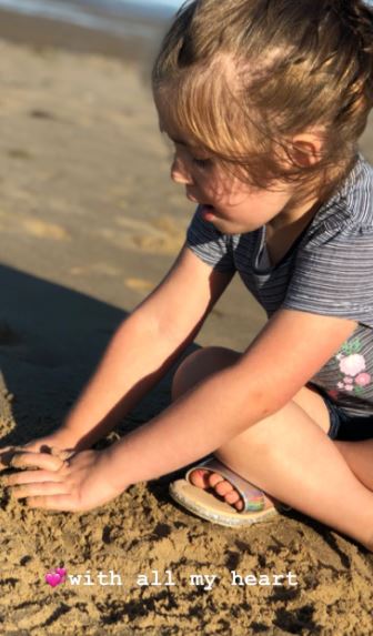 Jacqueline Jossa daughters Ella on the beach