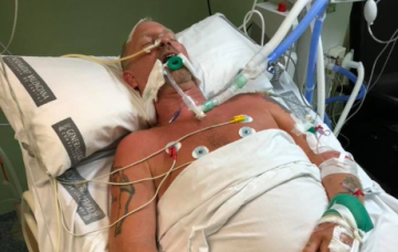 jimmy Carol in hospital following attack, picture shared on Facebook y his son (Credit: Facebook)