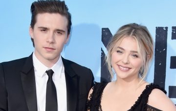 Brooklyn Beckham (L) and actress Chloe Grace Moretz attend the premiere of Universal Pictures' 'Neighbors 2: Sorority Rising' at the Regency Village Theatre