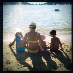 Emma Willis and her three children relax on the beach in Ibiza 