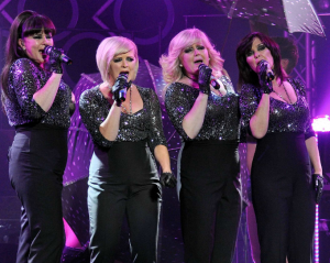 The Nolan sisters perform in 2013 (Credit: WENN)