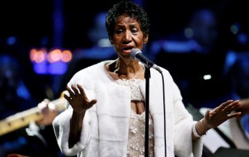 Aretha Franklin performs during the commemoration of the Elton John AIDS Foundation 25th year fall gala at the Cathedral of St. John the Divine in New York City