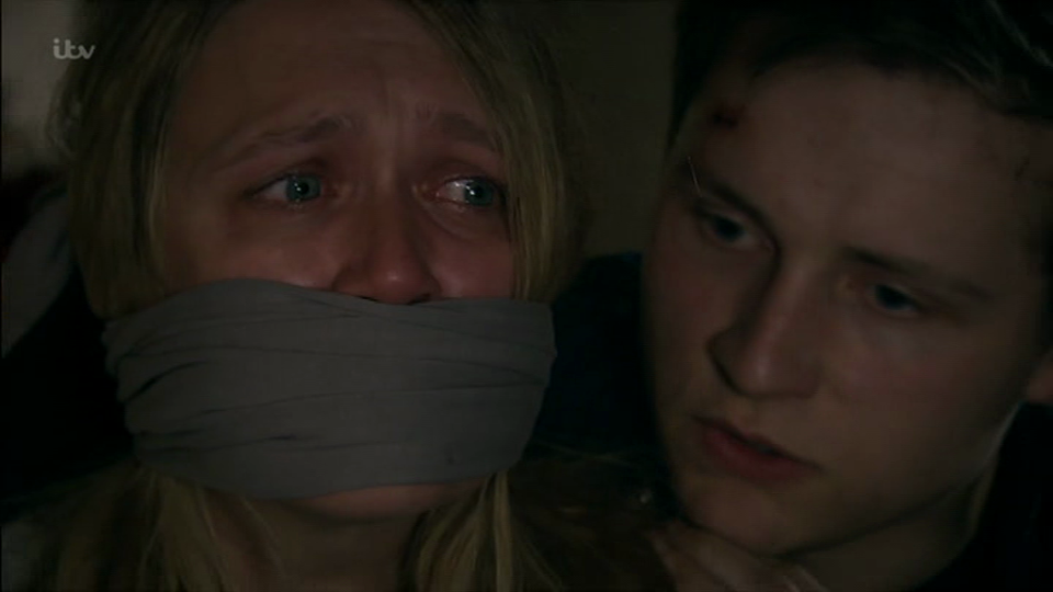 Emmerdale's Rebecca White stuffed in a suitcase