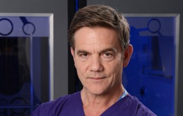 John Michie as Guy Self in Holby City