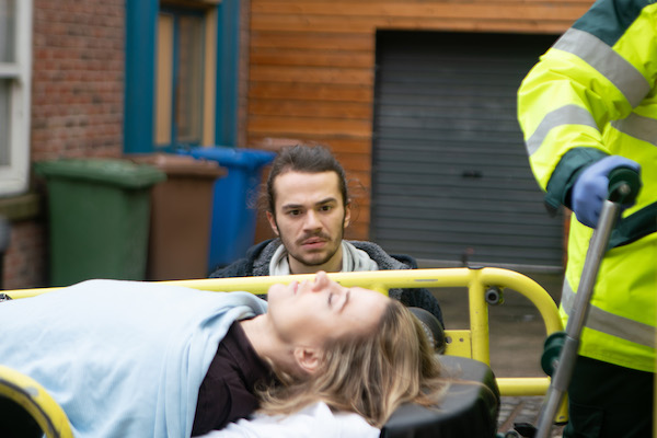 Coronation Street Seb watches Abi loaded into the ambulance
