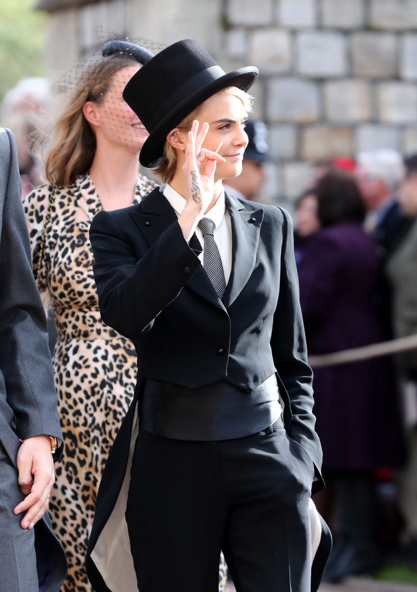 Cara Delevingne arrives ahead of the wedding of Princess Eugenie of York to Jack Brooksbank at Windsor Castle on October 12, 2018 in Windsor, England. (Photo by Gareth Fuller - WPA Pool/Getty Images)
