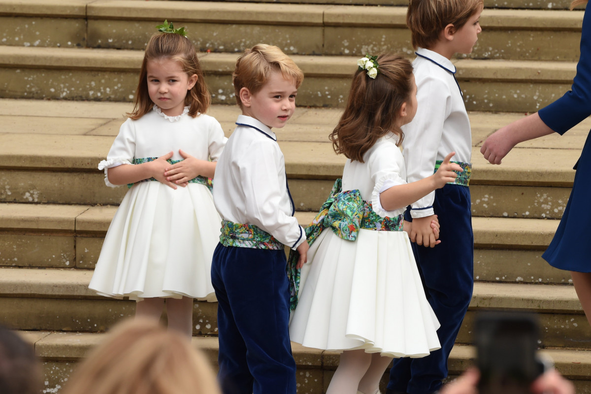 The bridesmaids and page boys including Prince George of Cambridge and Princess Charlotte of Cambridge arrive with Lady Louise Mountbatten-Windsor, for the wedding of Princess Eugenie to Jack Brooksbank at St George's Chapel in Windsor Castle on October 12, 2018 in Windsor, England. (Photo by Jeremy Selwyn - WPA Pool/Getty Images)