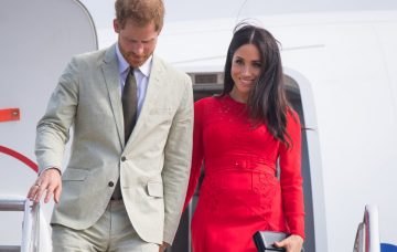 Prince Harry, Duke of Sussex and Meghan, Duchess of Sussex arrive at Fua'amotu Airport