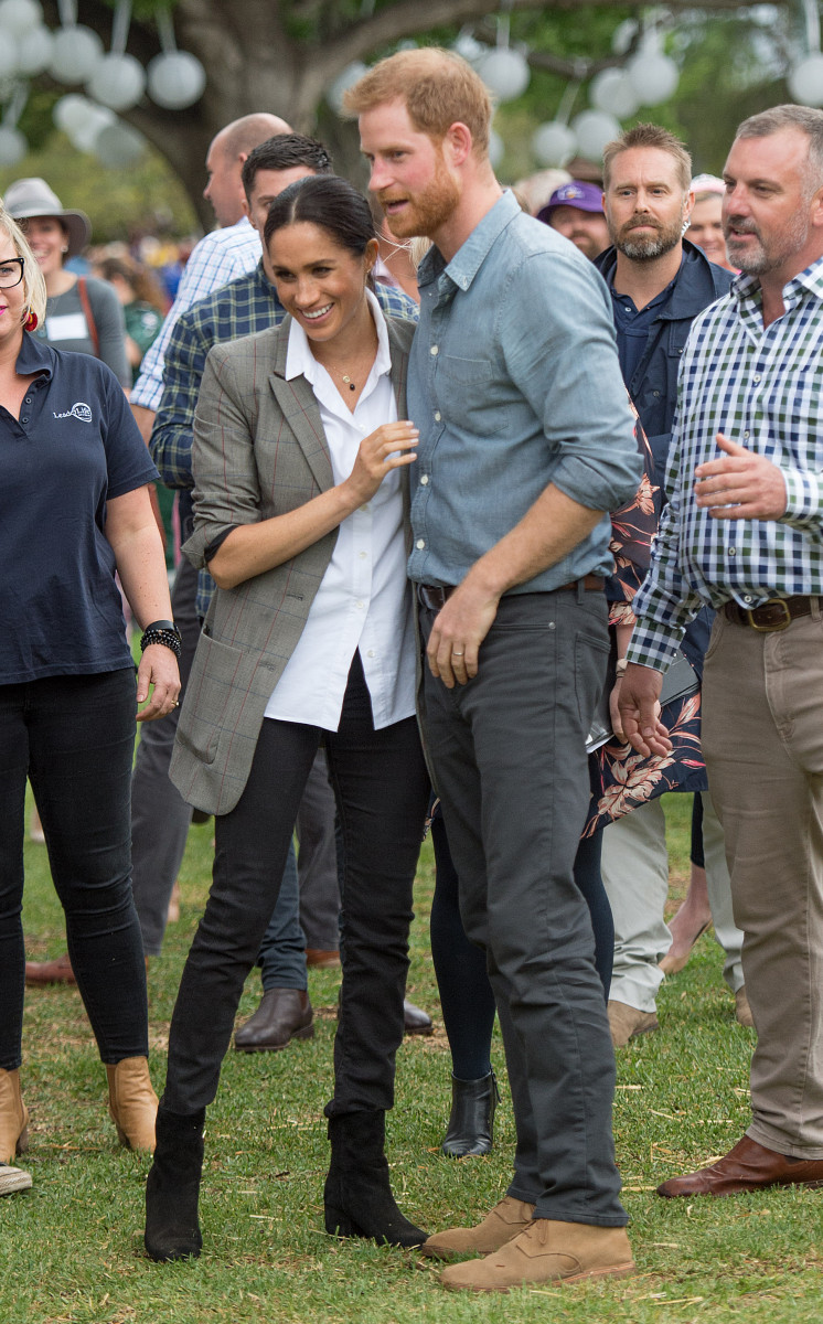 Prince Harry, the Duke of Sussex and Meghan, the Duchess of Sussex visit a Dubbo Community BBQ in Victoria Park