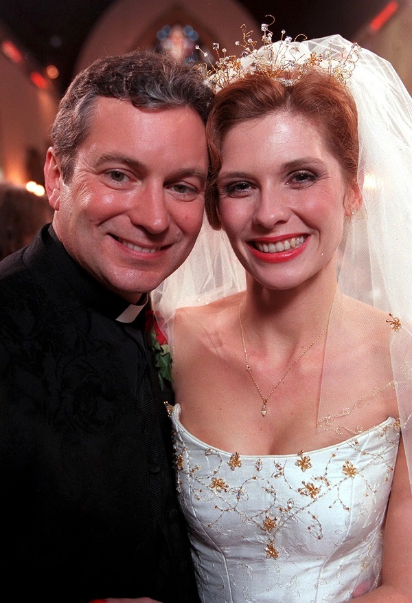Ashley Thomas and Bernice Blackstock smile in their wedding finery in Emmerdale