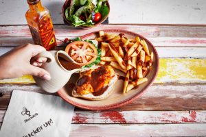 Nando's is famous for its Peri Peri Chicken (Credit: Nando's)