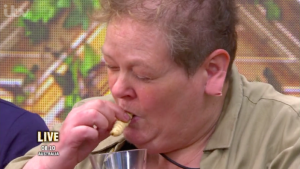 Anne tucking into a grub for a trial