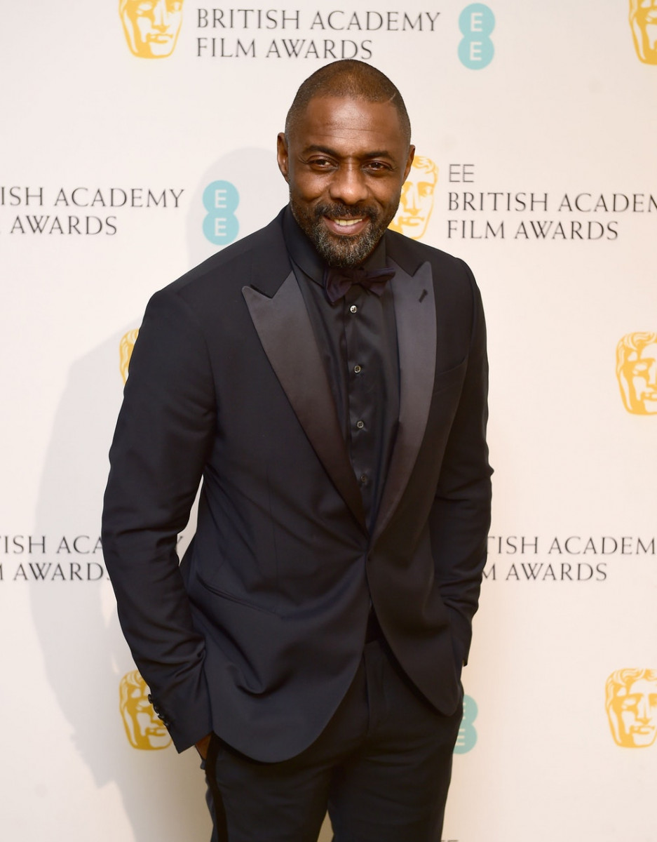 Idris Elba smiling at the after show party for the EE British Academy Film Awards at the Grosvenor House Hotel in central London 