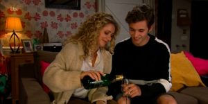 Maya Jacob drinking champagne before they kiss