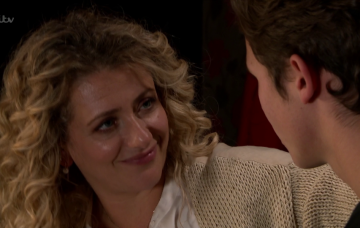 Maya and Jacob kiss