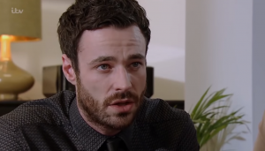 Sean as Callum Logan on Corrie (Credit: YouTube/ITV)