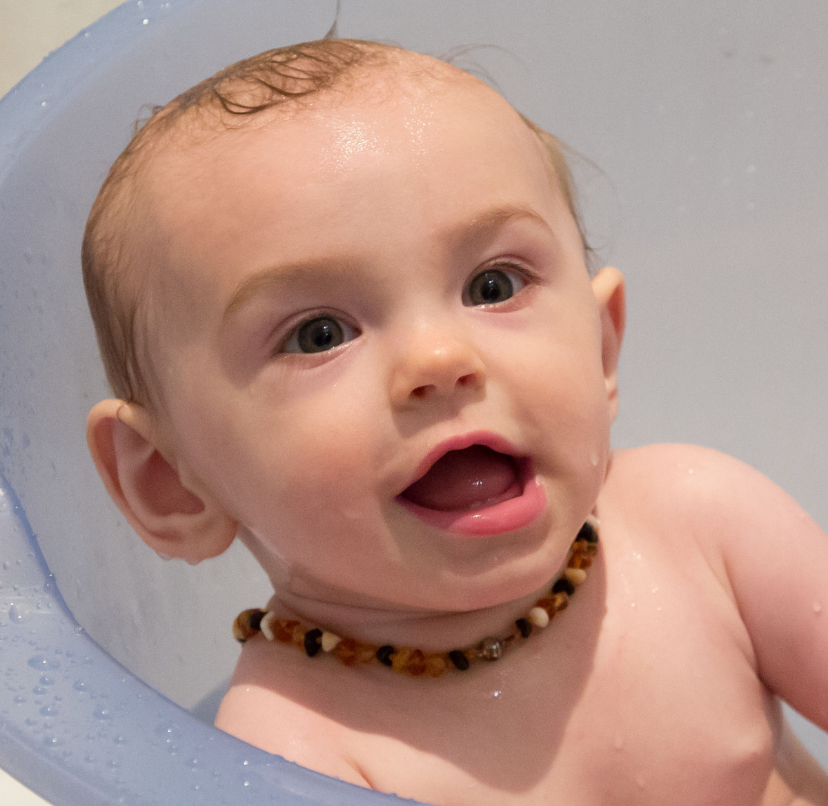 Baby with teething necklace