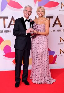 Philip Schofield and Holly Willoughby with the daytime award (Ian West/PA)