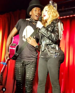 Madonna on stage with her son