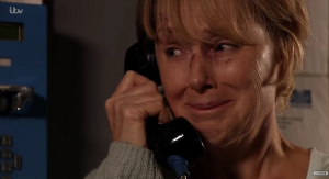 Sally creid down the phone