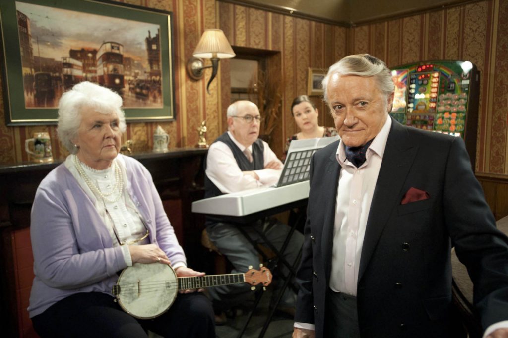 Coronation Street 2012 Coronation Street - Ep 7788 Friday 27 January 2012 at 7.30pm Sylvia [STEPHANIE COLE] is upset as she hasn't heard from Milton [ROBERT VAUGHN] for a few days but as her music contest with Norris Cole [MALCOLM HEBDEN] begins she's overjoyed as Milton appears beside her! 27 Jan 2012 Image ID: 3529622dc Featured in: Coronation Street 2012 Photo Credit: ITV/Shutterstock