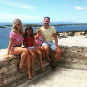 Tina O'Brien and Adam Crofts with their kids
