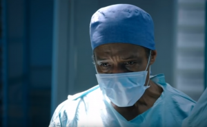 Ric Griffin performing surgery in Holby City
