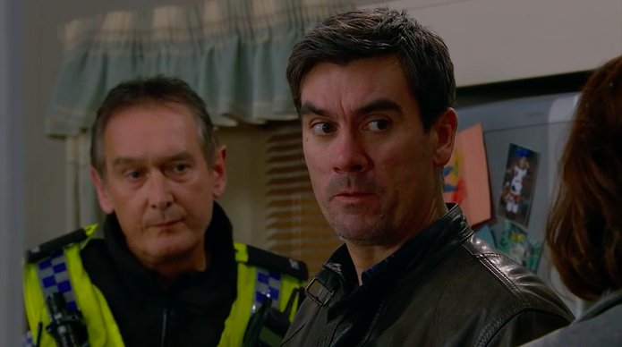 Cain and the police in Emmerdale