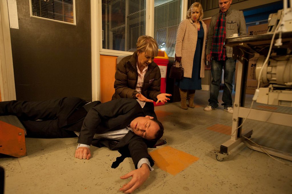 Mandatory Credit: Photo by ITV/REX/Shutterstock (3529633bu) Coronation Street - Ep 7816 Monday 5 March 2012 at 8.30pm Spotting the lights on at Underworld Sean Tully [ANTONY COTTON] and Julie Carp [KATY CAVANNAGH] decide to confront Frank but they're horrified to find Sally Webster [SALLY DYNEVOR] kneeling over Frank's body, blood on her hands. Has she killed him? Coronation Street 2012