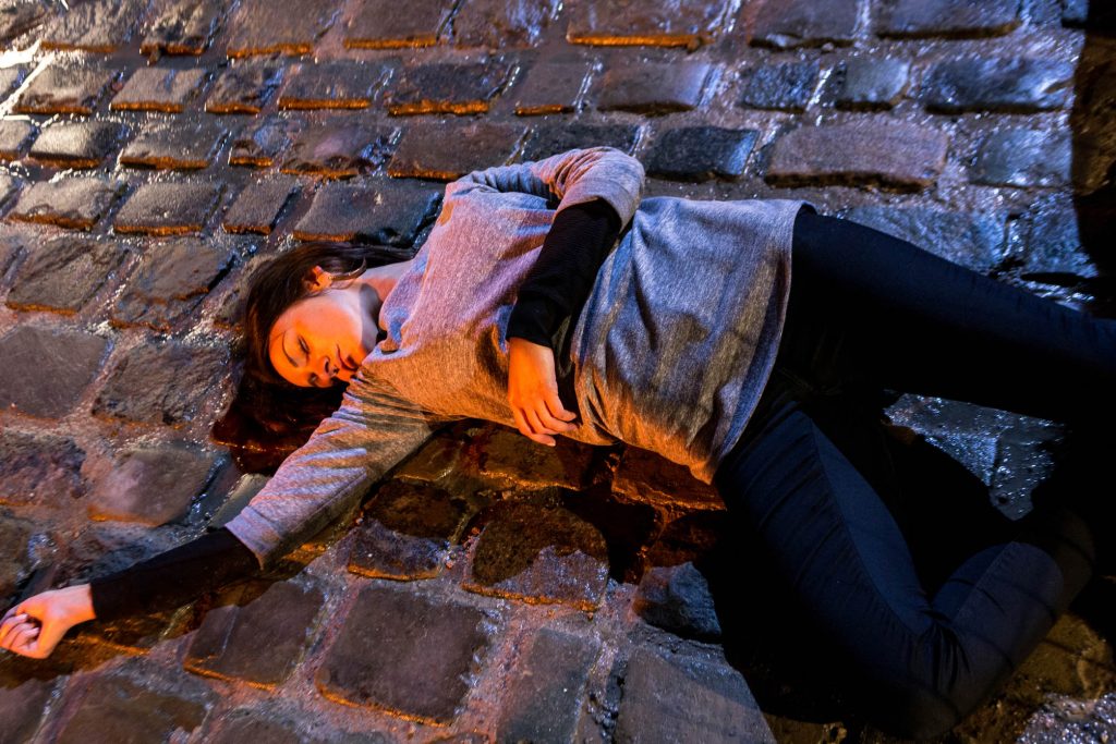 Editorial use only Mandatory Credit: Photo by ITV/REX/Shutterstock (3785776bd) Coronation Street barmaid Tina McIntyre, as played by Michelle Keegan, lies motionless on the cobbles after plunging from the balcony of the builder's yard flat following a dramatic showdown. 'Coronation Street' TV Programme - May 2014 Coronation Street Tuesday 27 June 