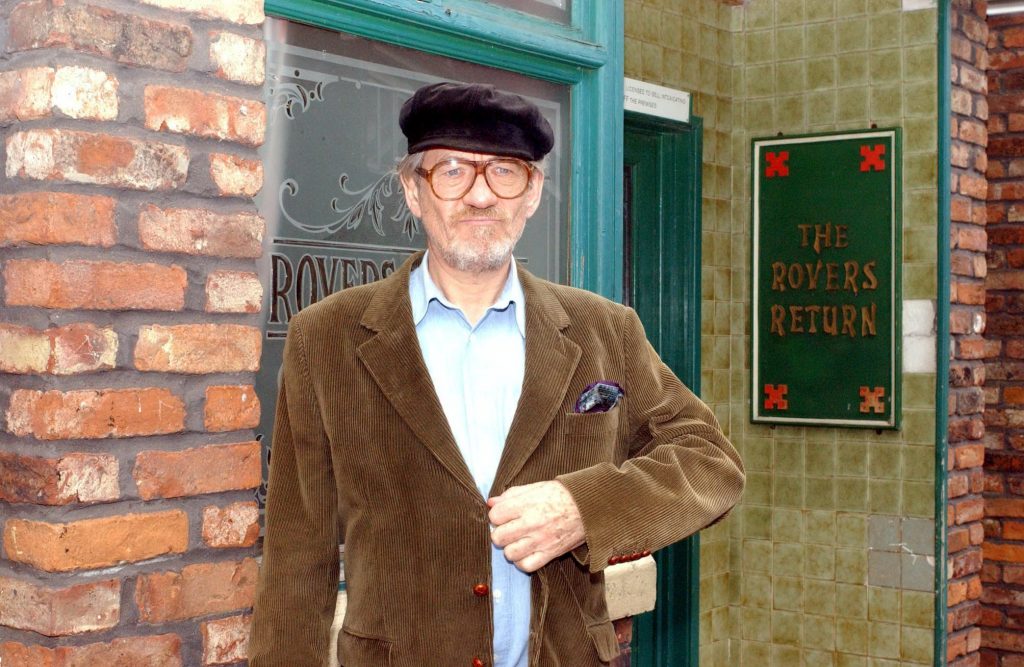 Sir Ian McKellen poses on the cobbles as confident Mel Hutchwright