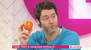 Howard clutches a fake orange on Lorraine