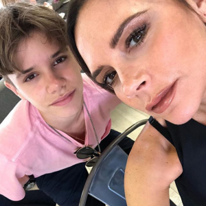Romeo Beckham and Victoria Beckham 