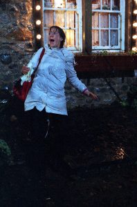 Tricia Dingle looks terrified in the storm as the chimney falls on her 