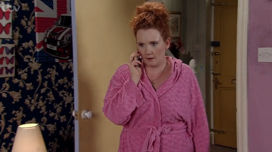 Fiz sneaking around in Coronation Street 