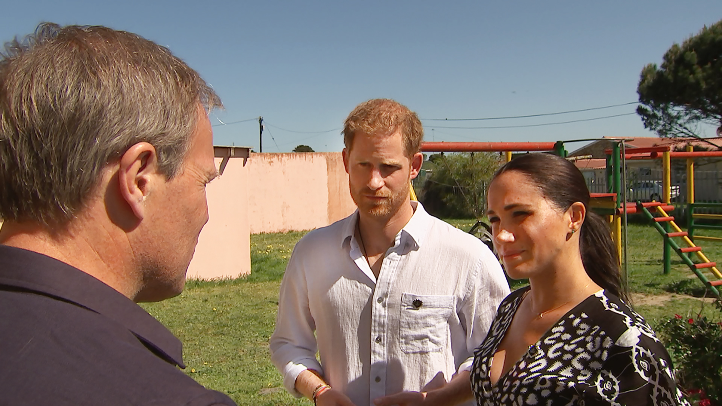 Harry and Meghan with Tom Bradby