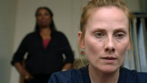 Programme Name: Holby City - TX: n/a - Episode: n/a (No. n/a) - Picture Shows: Max McGerry (JO MARTIN), Jac Naylor (ROSIE MARCEL) - (C) BBC - Photographer: Screengrab
