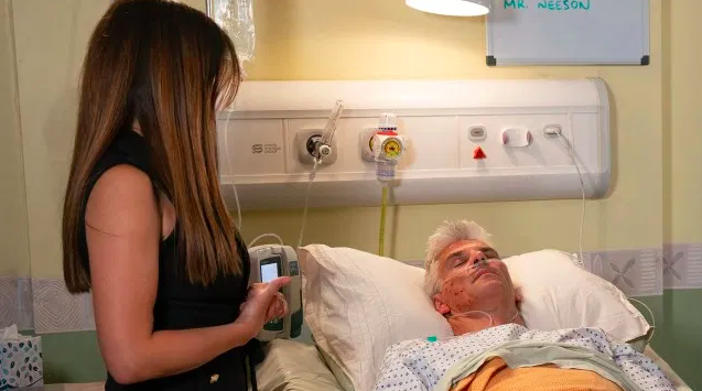 Michelle visits Robert in hospital