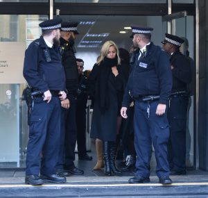 Caroline Flack leaving court in December