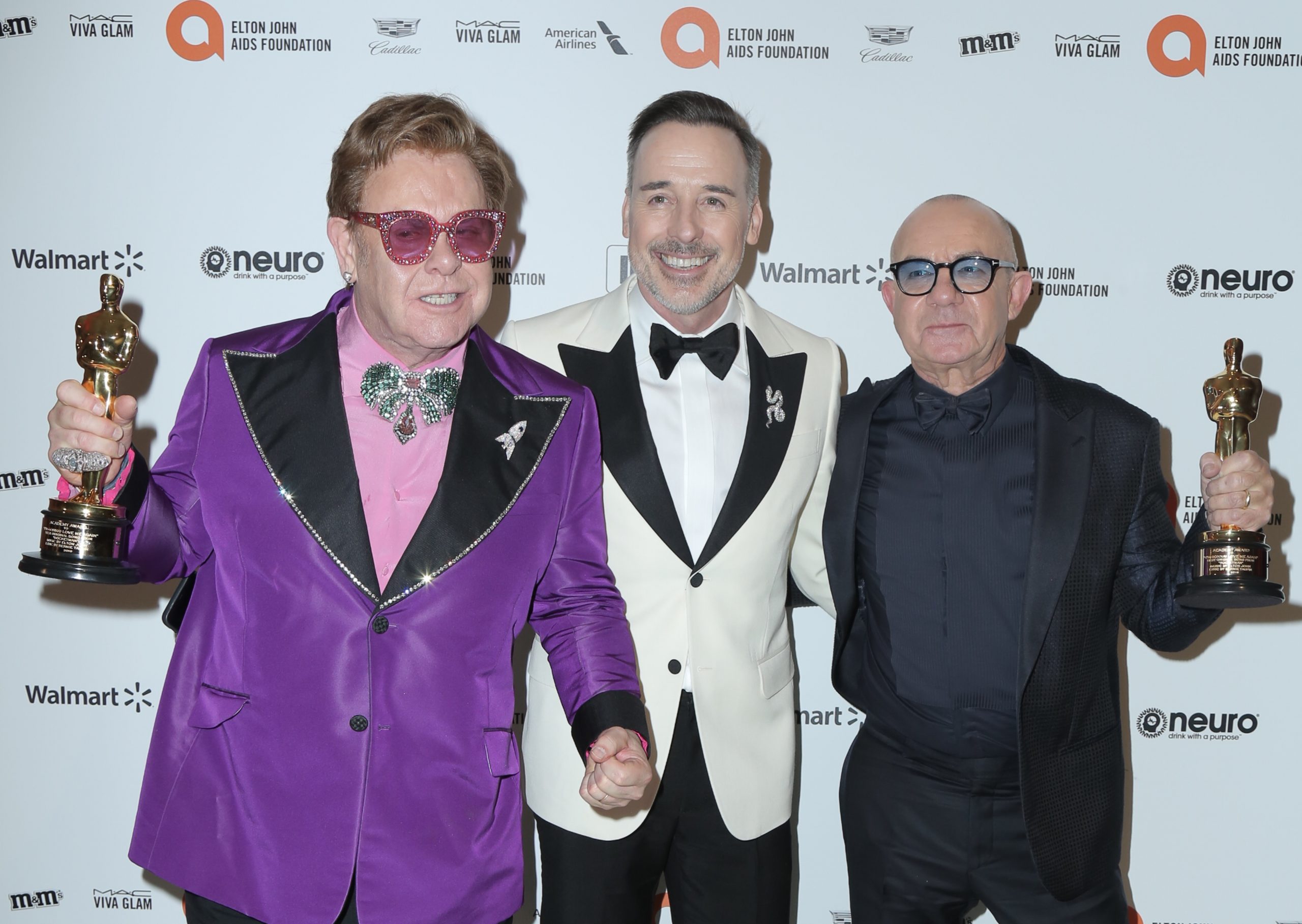 28th Annual Elton John Academy Awards Viewing Party held at West Hollywood Park. Photo Credit: PMA/AdMedia Pictured: Elton John,David Furnish,Bernie Taupin Ref: SPL5147565 090220 NON-EXCLUSIVE Picture by: PMA/AdMedia / SplashNews.com Splash News and Pictures Los Angeles: 310-821-2666 New York: 212-619-2666 London: +44 (0)20 7644 7656 Berlin: +49 175 3764 166 photodesk@splashnews.com World Rights