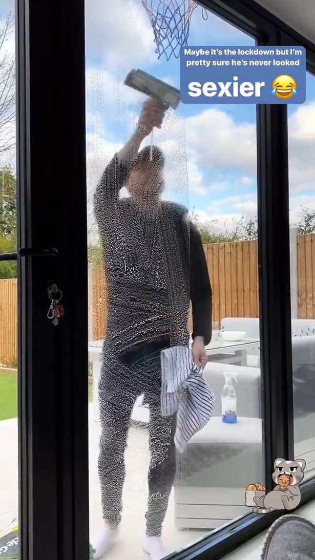 Joe Swash cleans windows