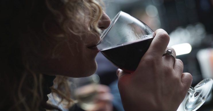 alcohol ban woman drinking wine