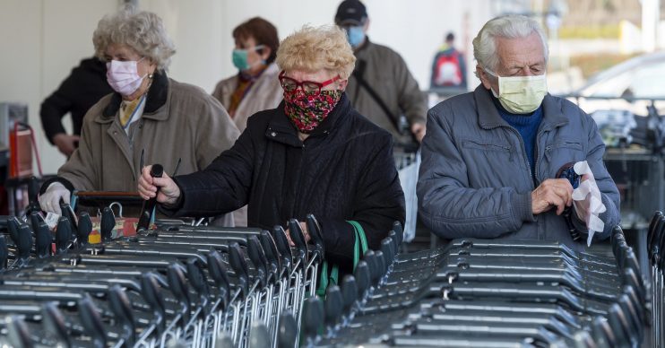 Elderly people wearing masks in the outbreak, as people ask when coronavirus will end