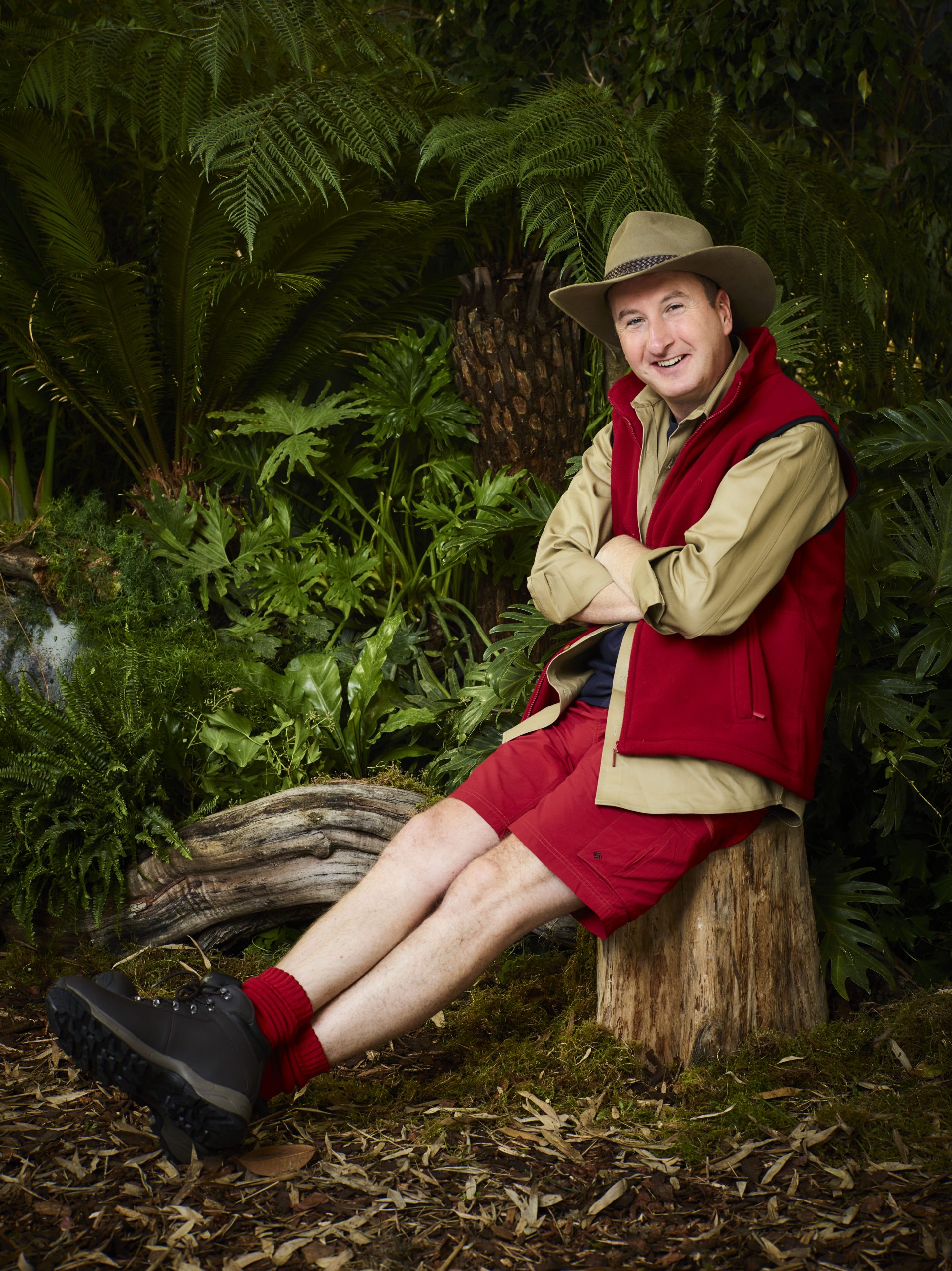 Andy kept his hair under a hat in I'm A Celebrity... Get Me Out of Here (Credit: ITV)