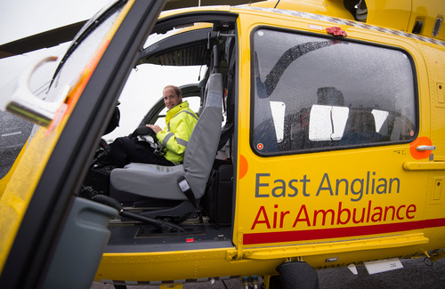 Prince William in the cockpit of his air ambulance in 2015 (Credit: Splash News)