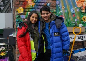 Asha and Aadi Alahan smile in behind the scenes shot for Coronation Street